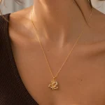 GOLD ZİRKON VE SADEF TAŞLI BOYUTLU KELEBEK TASARIM ÇELİK KOLYE – FKÇLK0065-4865 - Ayşe Kafkas Butik