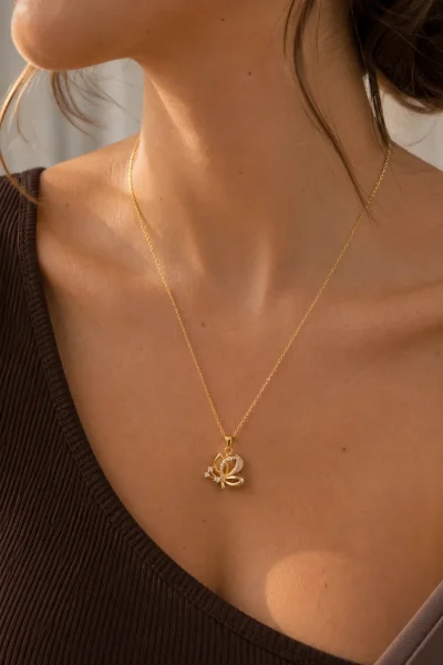 GOLD ZİRKON VE SADEF TAŞLI BOYUTLU KELEBEK TASARIM ÇELİK KOLYE – FKÇLK0065-4865 - Ayşe Kafkas Butik